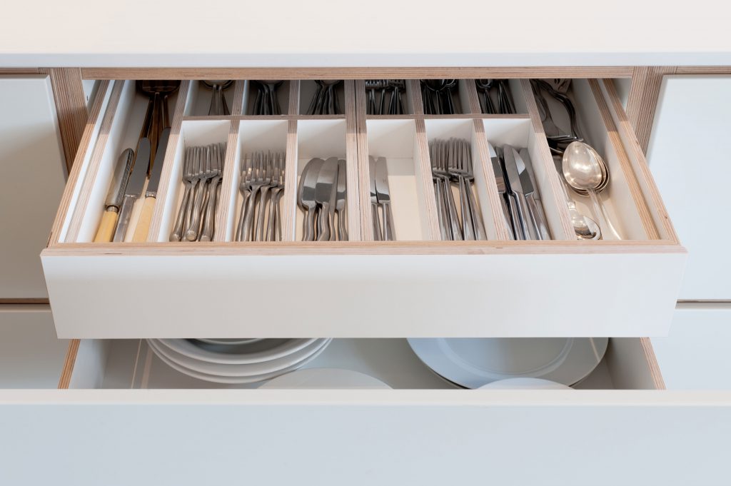 Don't forget to think about hidden drawers and internal mechanisms when you're planning your kitchen design.