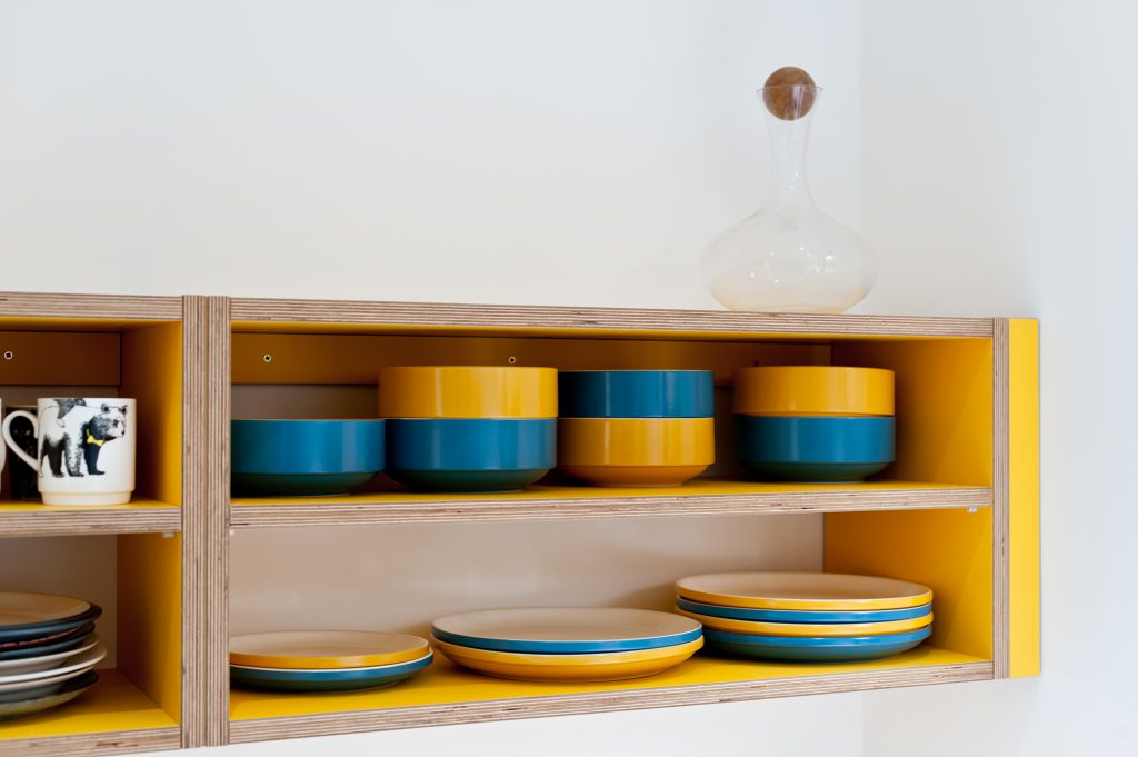 Plywood open shelves in yellow