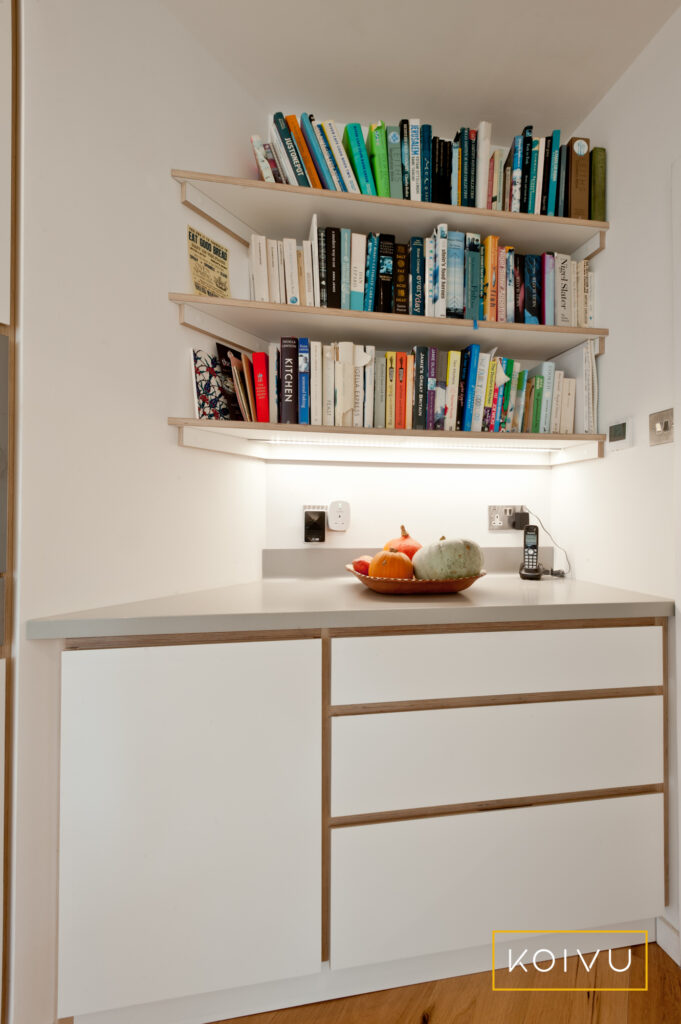 Open shelving and angled unit made bespoke for unusual shaped alcove in Tunbridge Wells kitchen. By Koivu.