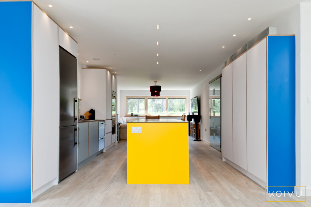 White kitchen with island in the middle