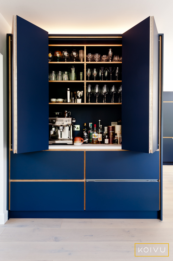 Bespoke butler's cupboard with folding hideaway doors