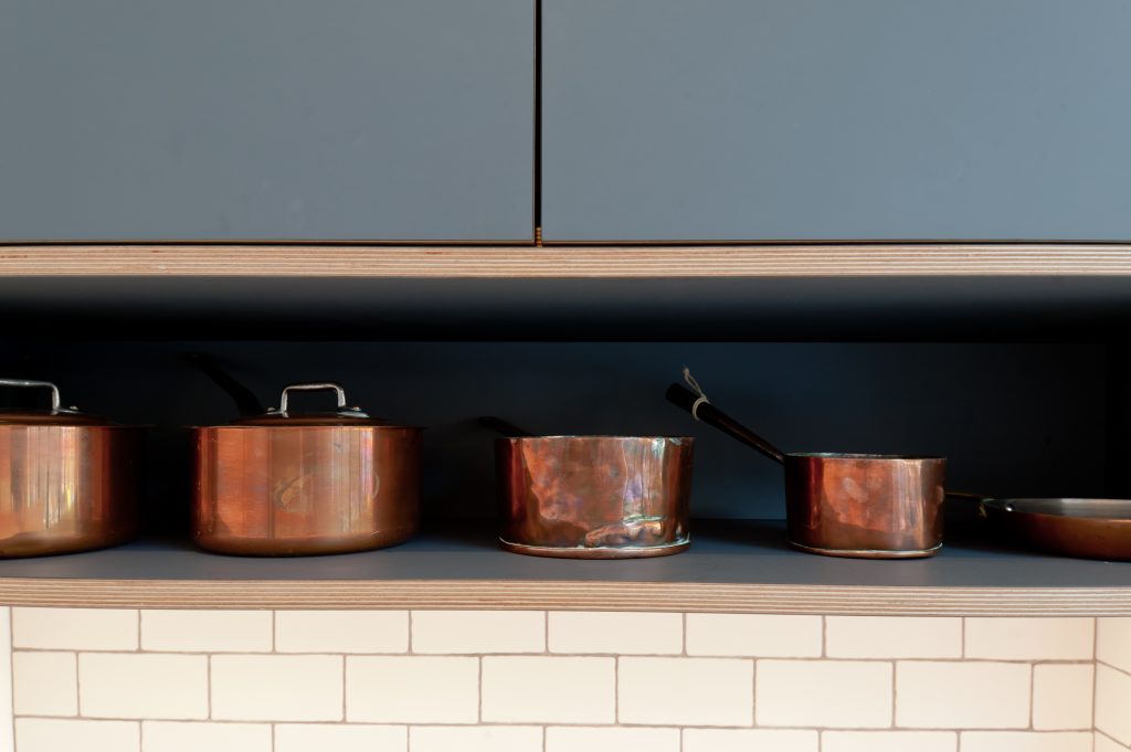 Dark grey plywood kitchen - close up detail of beautiful plywood edges.