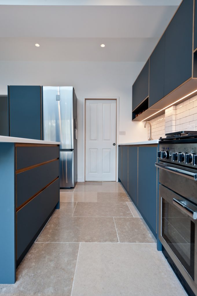 South London kitchen fitted with bespoke dark grey plywood units by Koivu.