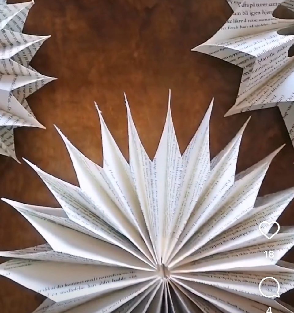 Origami stars made from book pages. Recycling for an eco-friendly Christmas. 
